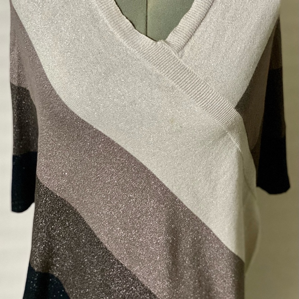 Metallic multi-color cotton/viscose poncho.